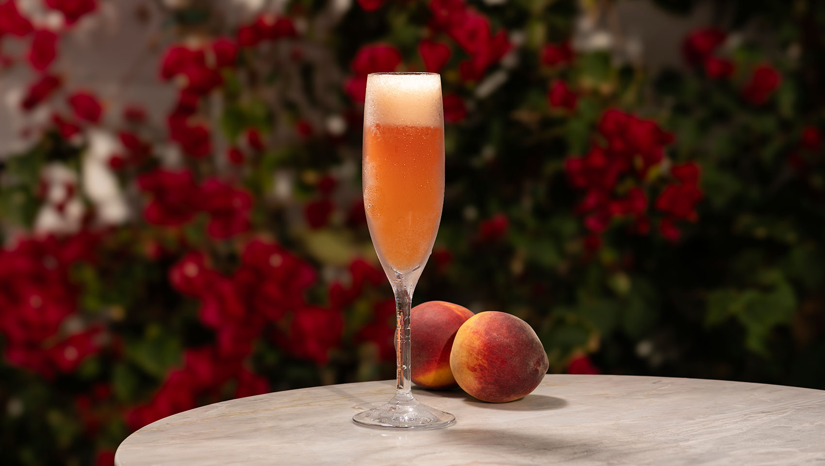 image of cocktail and peaches
