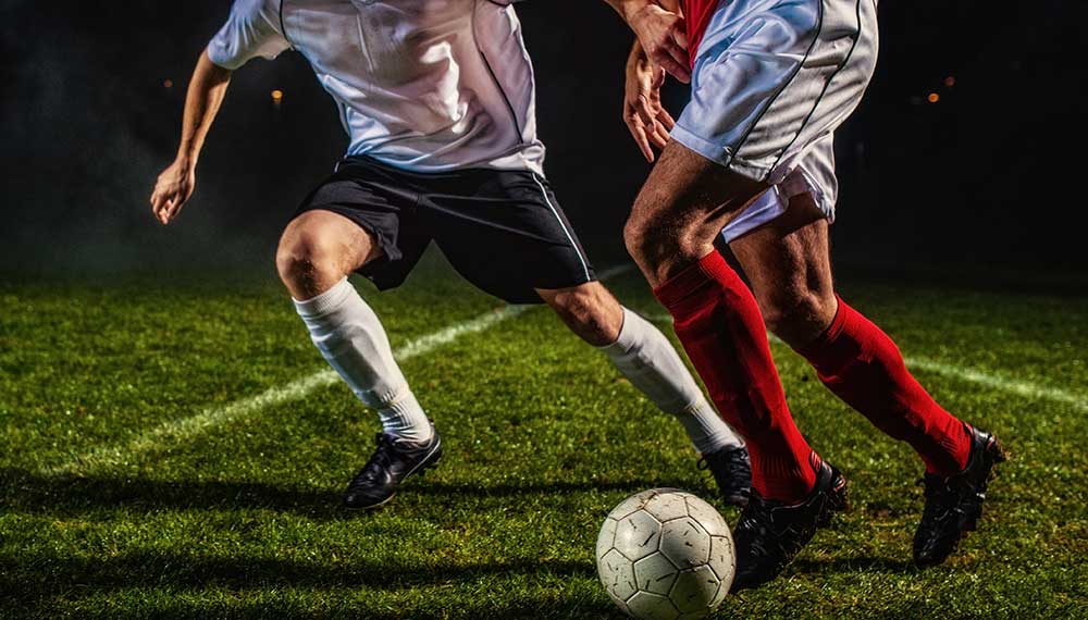 Men playing soccer