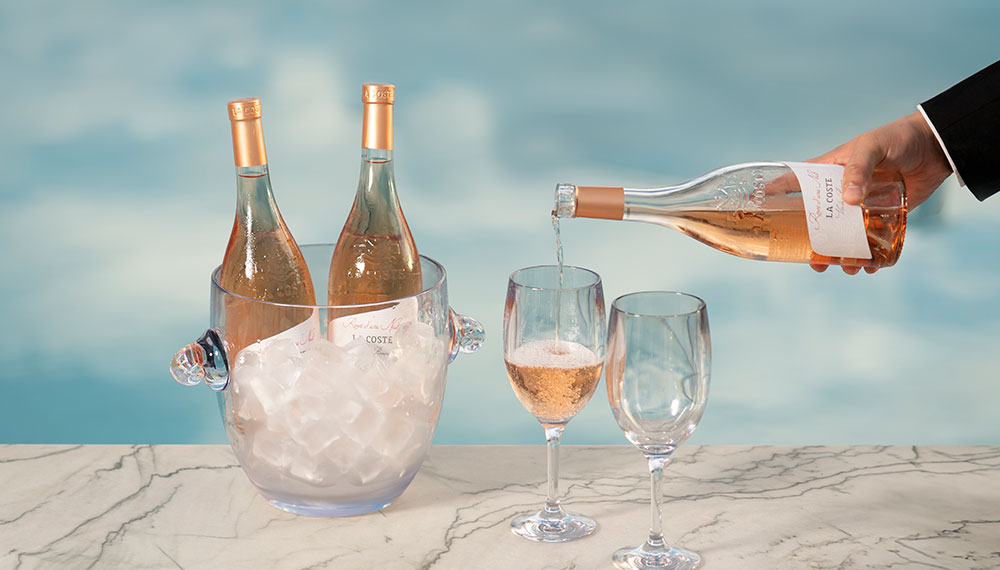 Wine being poured poolside